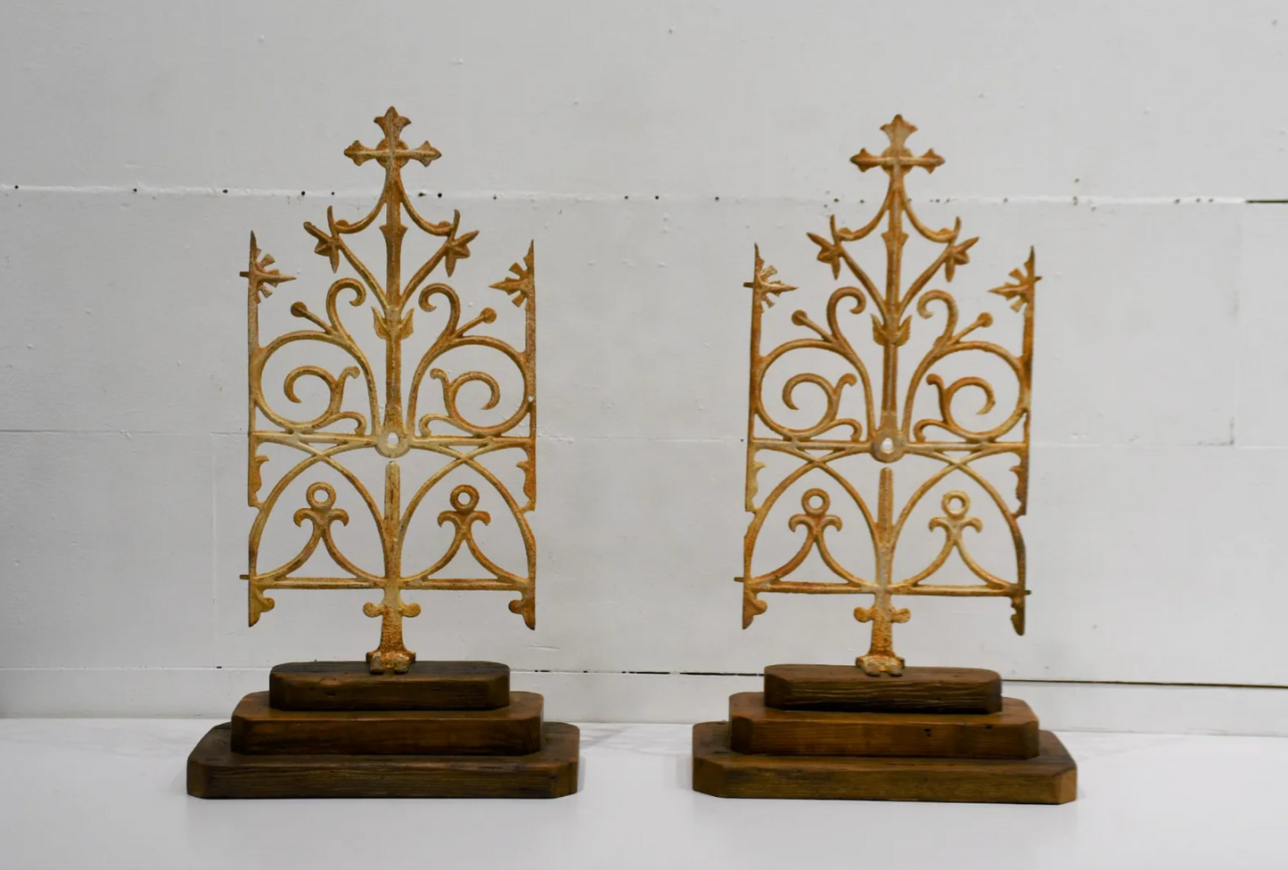 Pair of Architectural Iron Fragments on Wood Bases