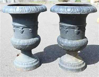 Pair of Iron Urns with Round Bases